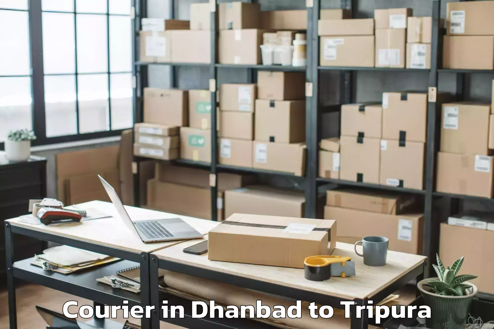 Dhanbad to Manughat Courier Booking